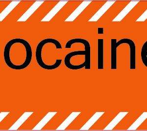 Lignocaine- 40 x 12, PAPER, Black print on Orange Label with White Diagonal stripes, 800 per roll